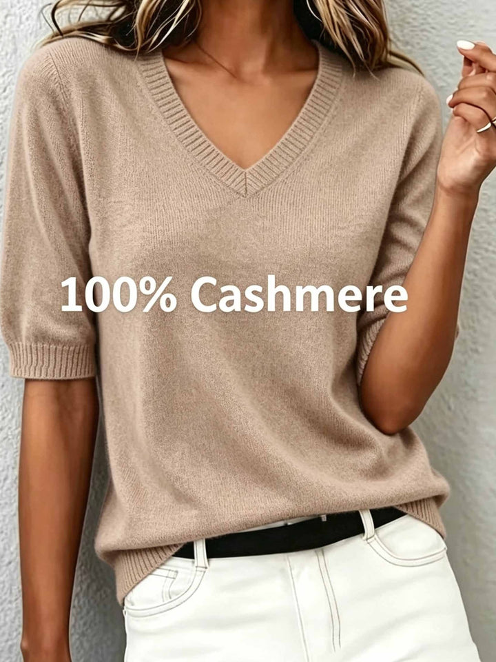 Stylish women's short sleeve V-neck sweater with ribbed collar, comfortable for any occasion.
