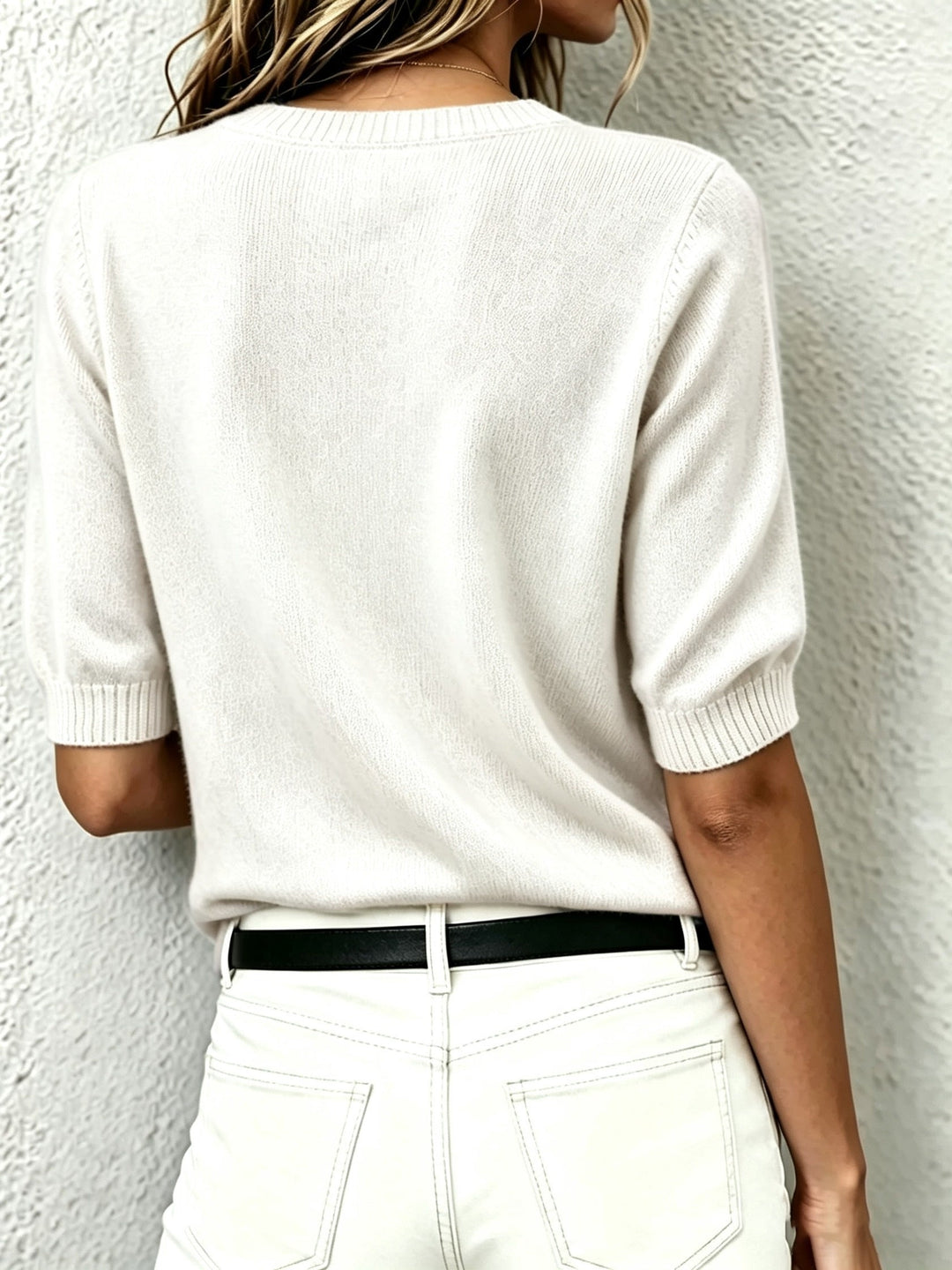 Chic women's V-neck short sleeve sweater, comfortable apparel with a versatile ribbed collar design.