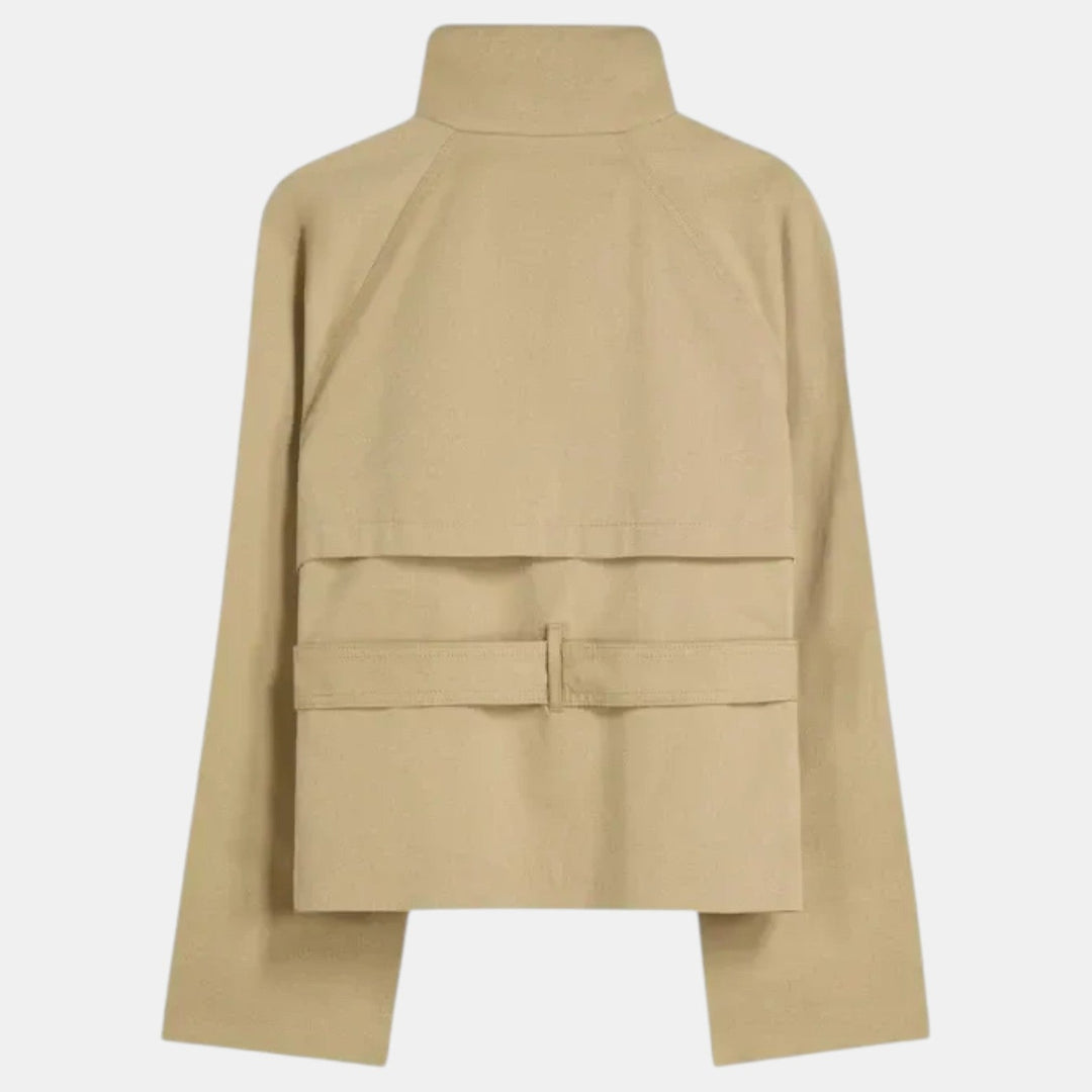 Classic women's short trench coat, perfect as a lightweight jacket for casual wear or work outerwear. Features adjustable belt.