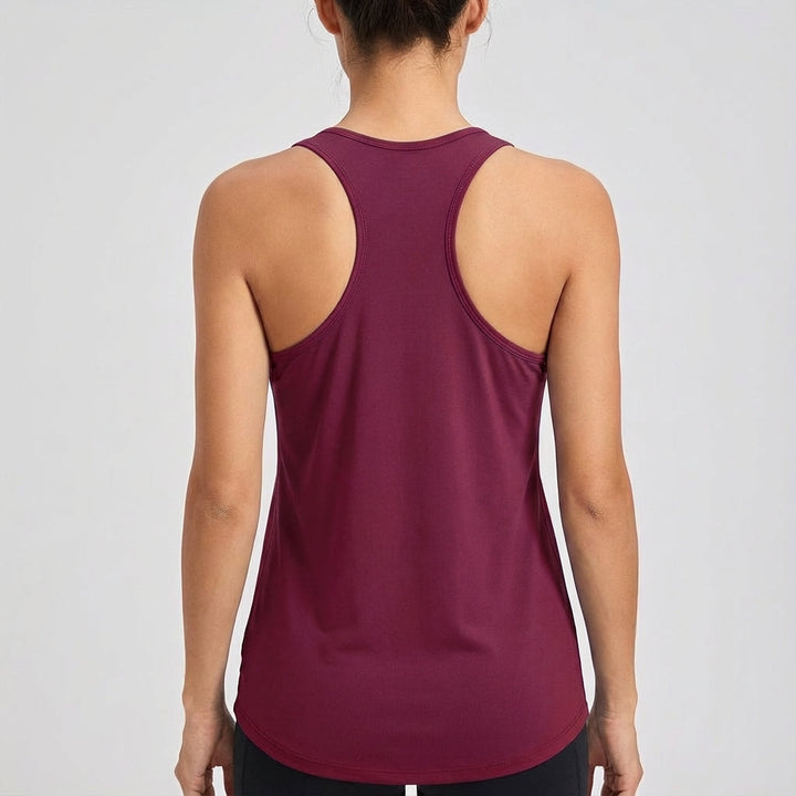 Solid color sleeveless women's workout top, comfortable & breathable activewear for fitness.