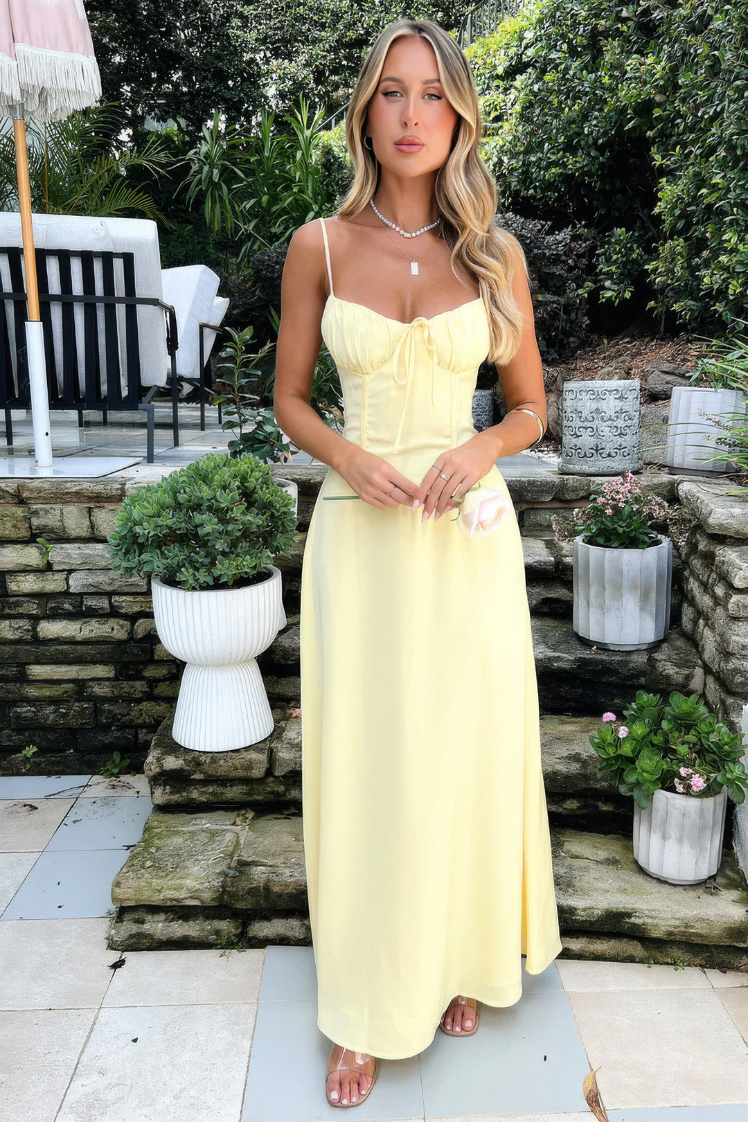 Versatile sleeveless A-line maxi dress for women, suitable for casual to elegant events.