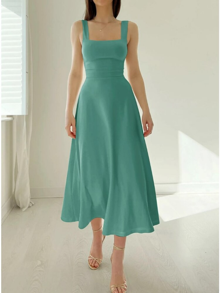 Classic elegant women's midi dress. Sleeveless A-line design offers a flattering fit, ideal for various events.