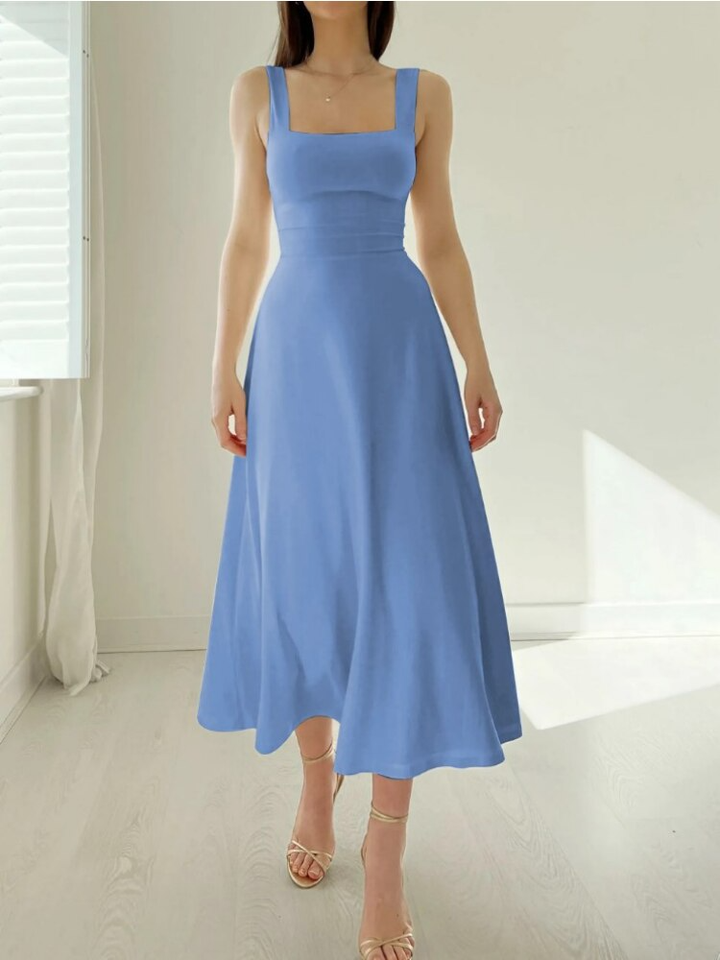 Chic sleeveless A-line women's midi dress. Modern design with an easy, comfortable fit for versatile summer styling.