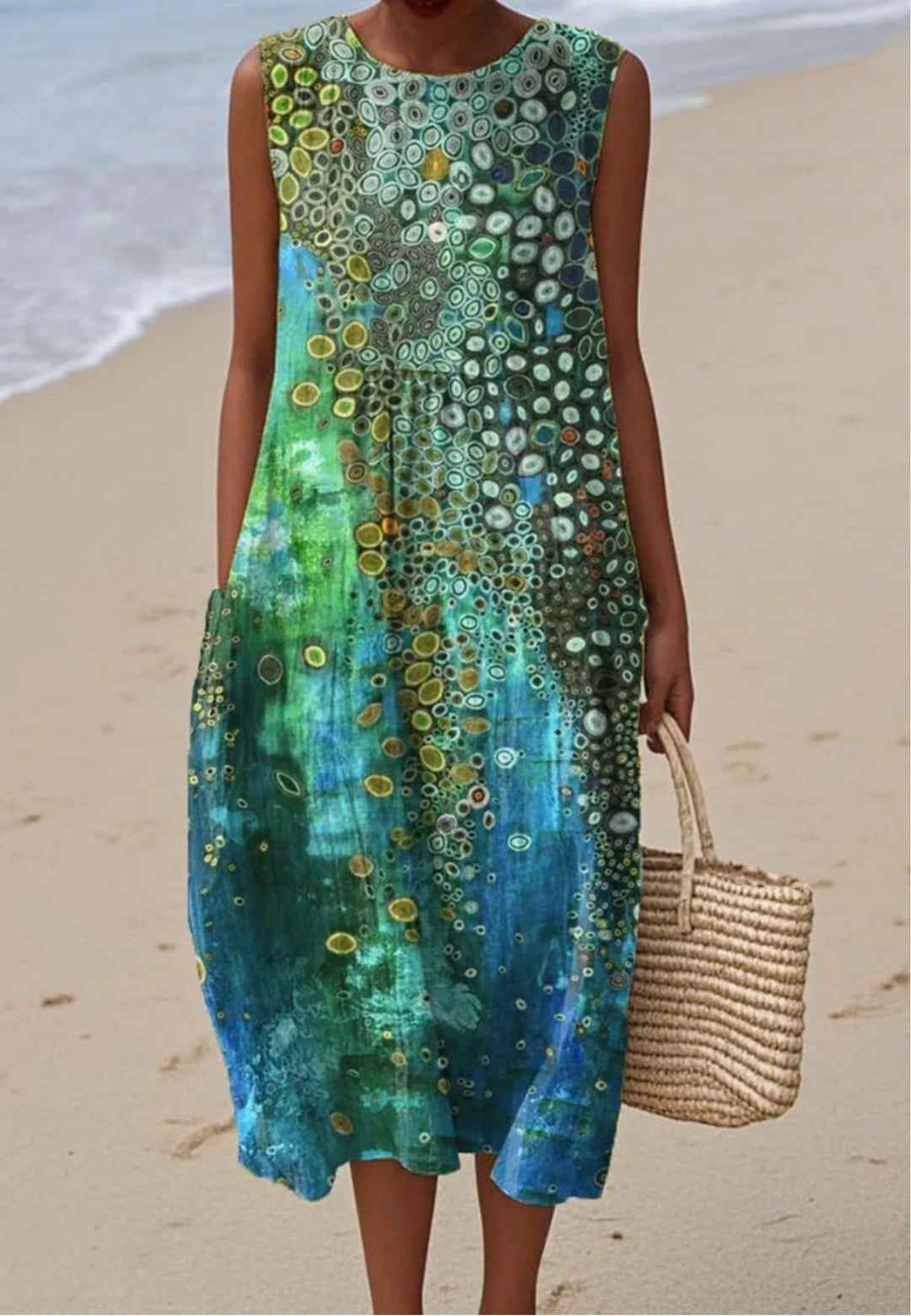 Women's sleeveless abstract pattern summer dress, flowy and relaxed fit, ideal for beach, casual day, or vacation.