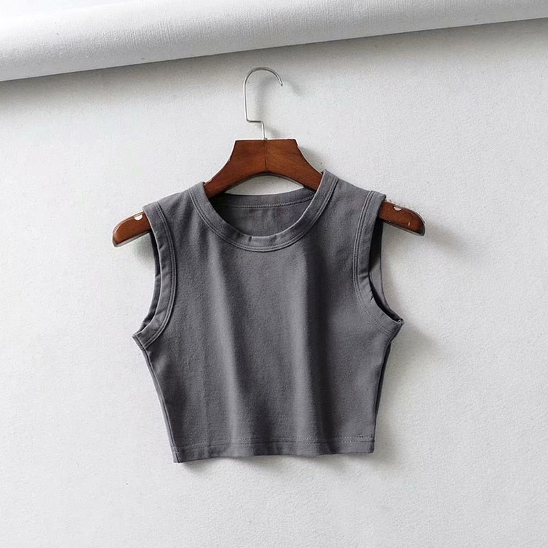 Stylish fitted women's sleeveless crop top. Modern everyday style, perfect for summer casual wear.