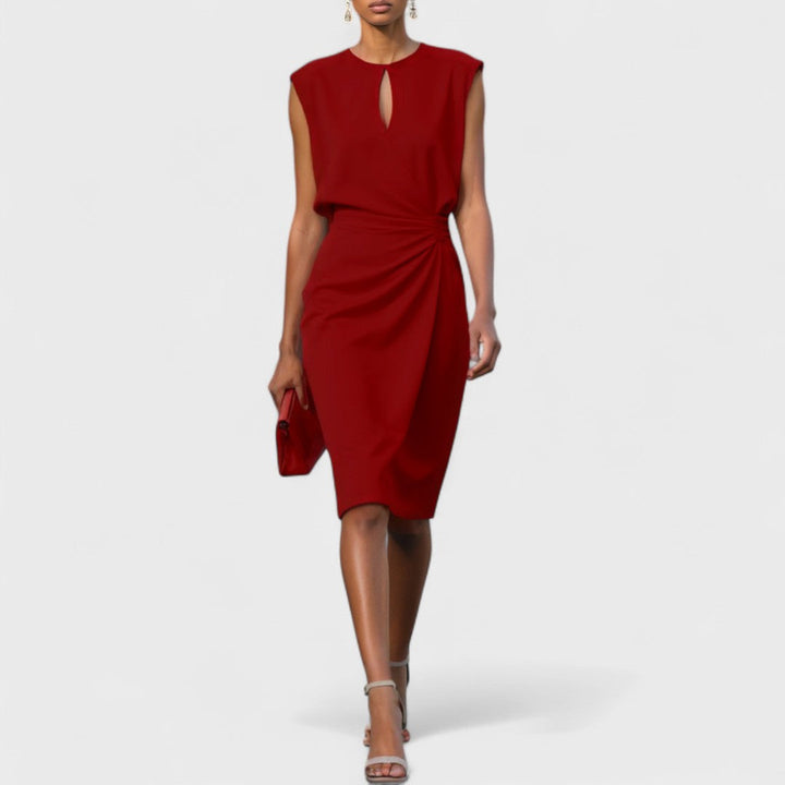 Women's elegant sleeveless midi dress showcasing a fashionable cutout and a sophisticated pleated side drape.