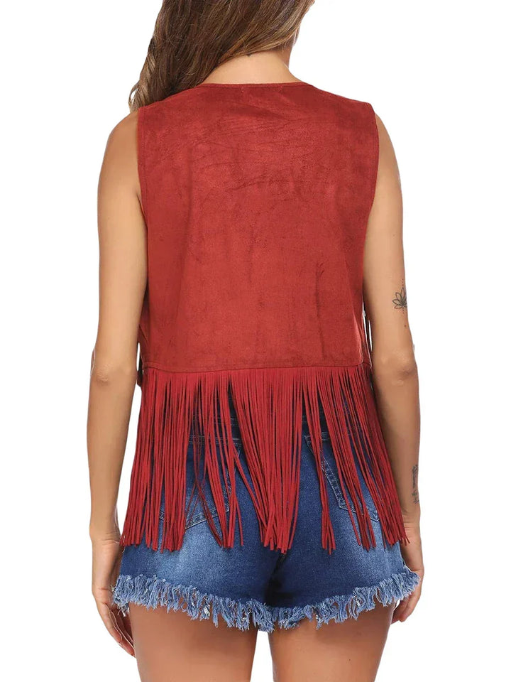 Stand out in this women's sleeveless fringe open front vest, a must-have for edgy boho style.