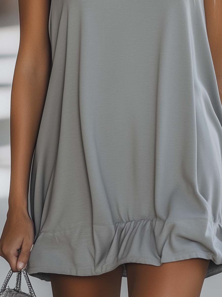 Chic women's hooded mini dress, sleeveless with a cute ruffle hem. Great for casual summer wear.