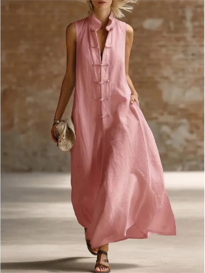 Chic women's sleeveless maxi shirt dress for summer vacation, beach trips, or resort wear. Lightweight and flowy.