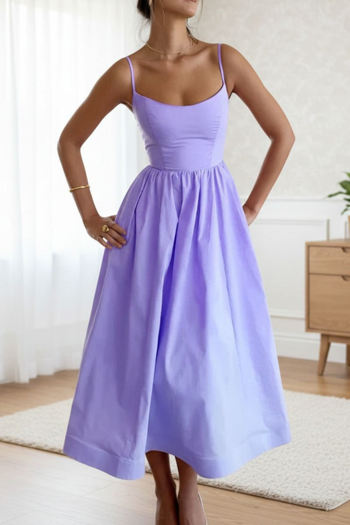 Fashionable women's sleeveless midi cocktail dress for elegant spring & summer evening events. Scoop neck.
