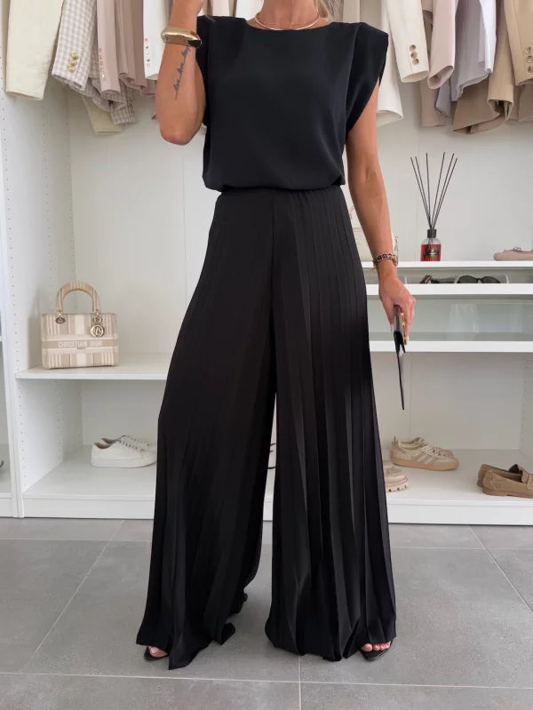 Stylish women's summer outfit: comfortable sleeveless top & flowy wide-leg pants matching set.