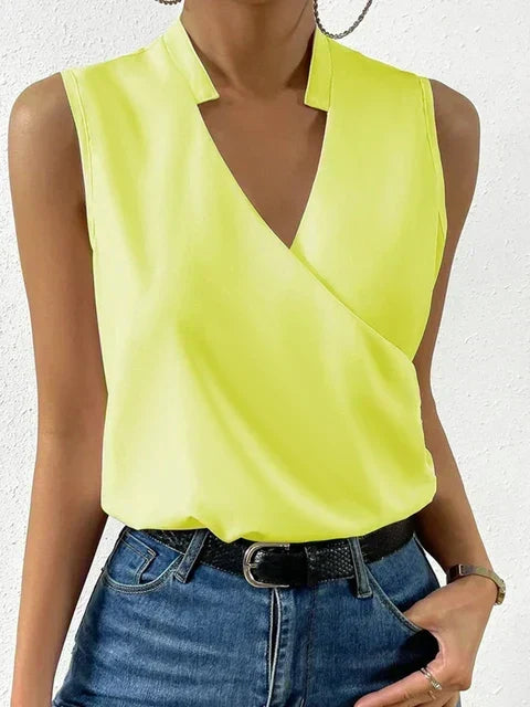 Elegant women's sleeveless wrap V-neck top. Relaxed fit blouse, perfect for smart casual & summer fashion.