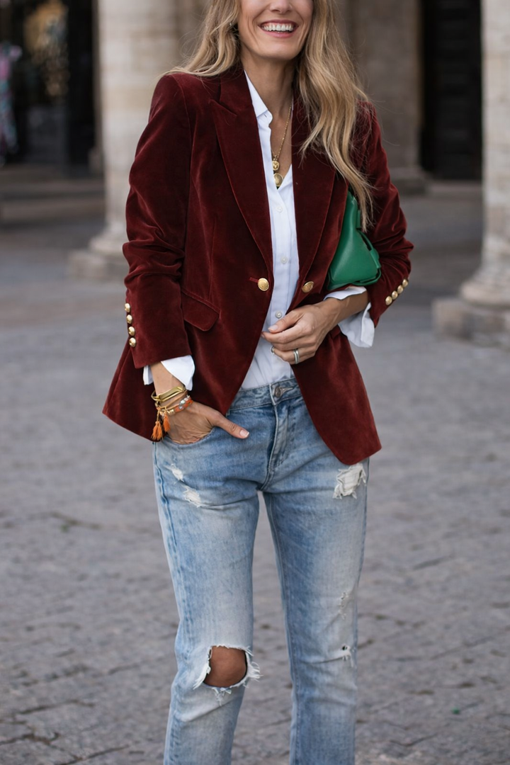 Elegant women's slim fit blazer with sophisticated gold buttons & a crisp peak lapel, evening-ready.