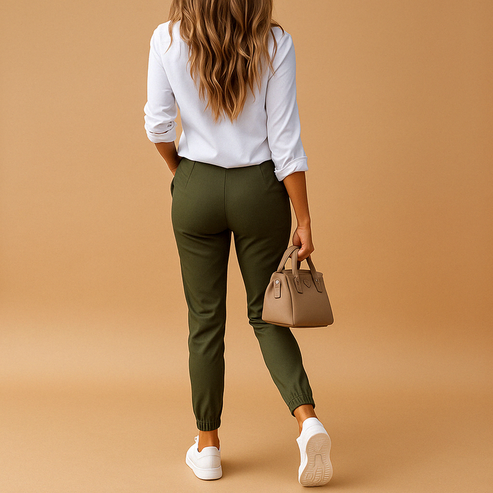 Women's slim fit stretch chino trousers, showcasing comfortable fabric & modern cut. Ideal for office or casual looks.