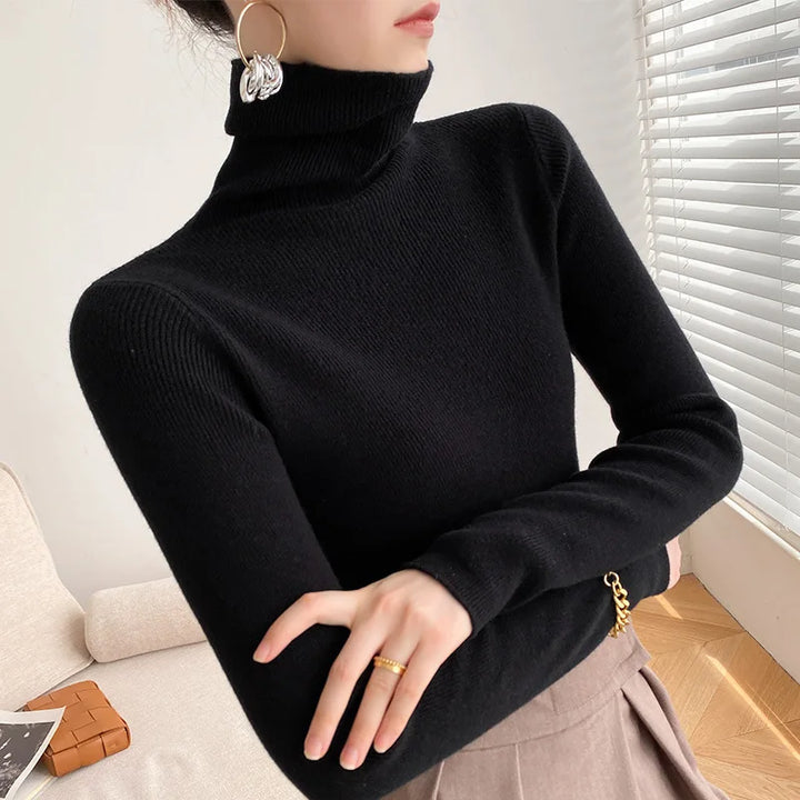 Stylish women's slim fit turtleneck sweater. Long sleeve knit, perfect for versatile fall & winter fashion.