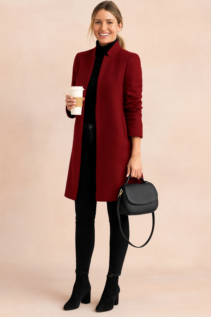 Structured women's tailored coat, a sophisticated slim fit jacket for professional and chic casual looks.