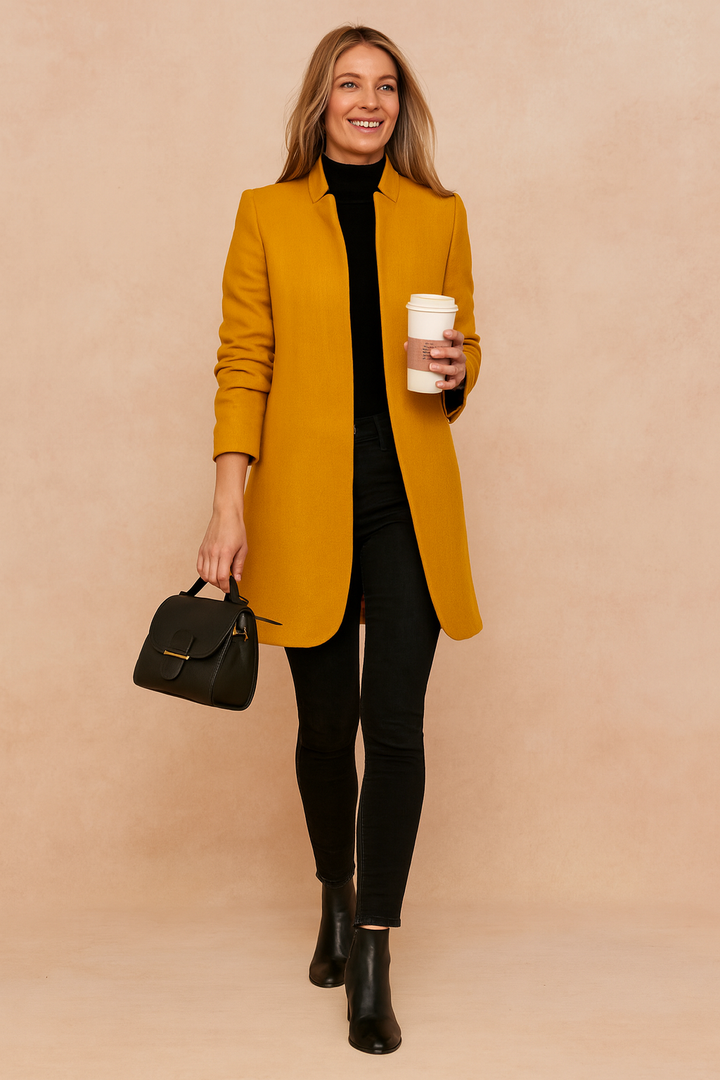Versatile women's slim tailored coat with structured design, ideal for elegant workwear and sophisticated winter style.