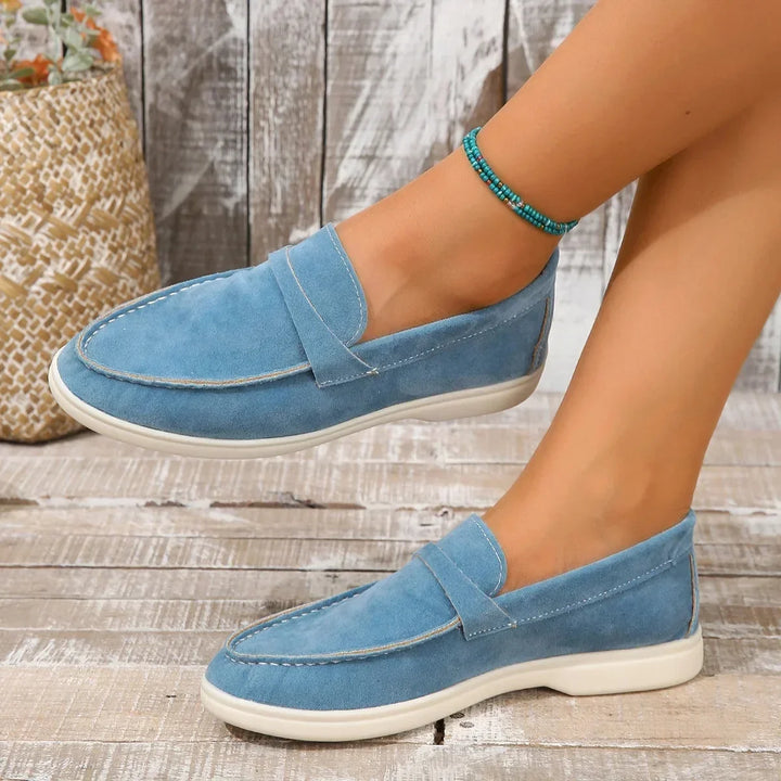 Professional women's flats, cushioned slip-on loafers perfect for long days at the office or casual use.