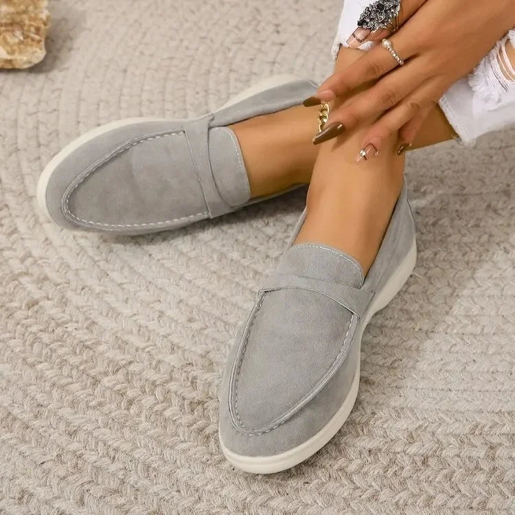 Stylish women's slip-on flats, designed for all-day comfort, ideal for work and casual outings.