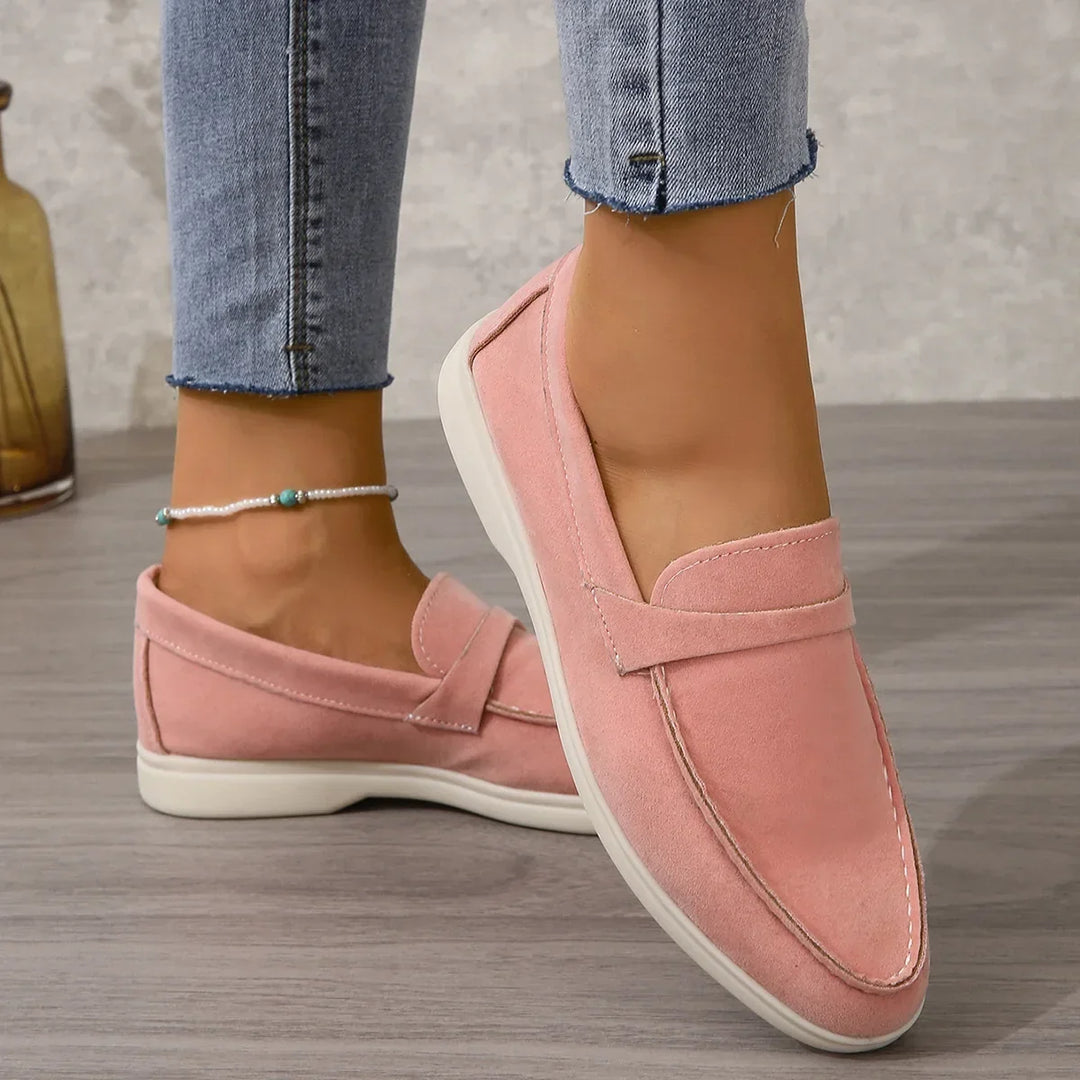 Elegant women's flat loafers, easy slip-on design for a blend of office professionalism & casual ease.