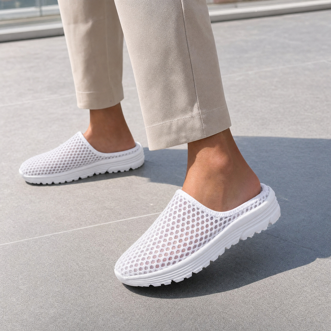 Comfortable women's slip-on sneakers with advanced orthopedic & arch support for all-day foot health.