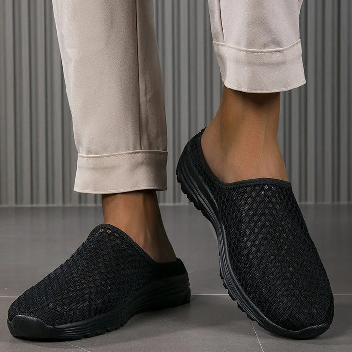 Top-down view of women's comfortable slip-on sneakers, emphasizing the easy-wear design & breathable material.