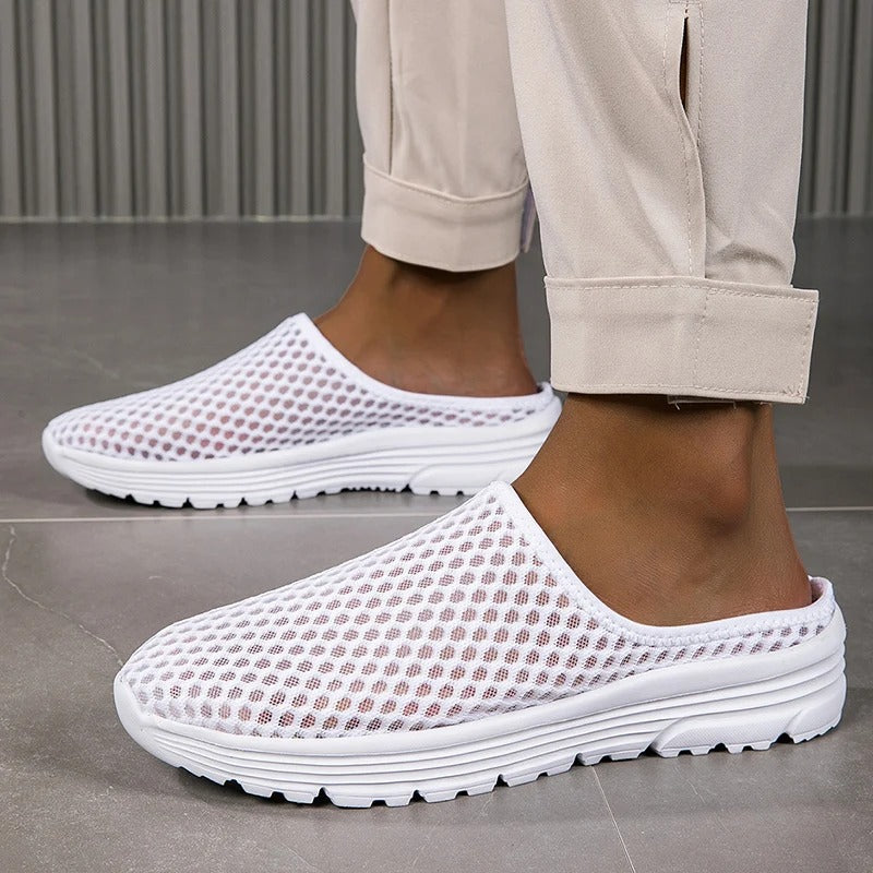 Durable sole of women's orthopedic slip-on sneakers, providing excellent grip & essential arch support.