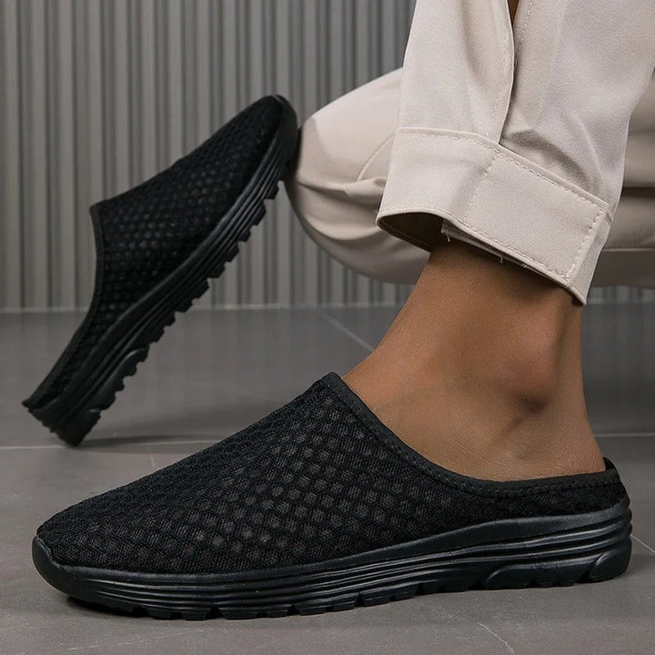 Pair of women's stylish slip-on sneakers, featuring orthopedic arch support & cushioned comfort for daily activities.