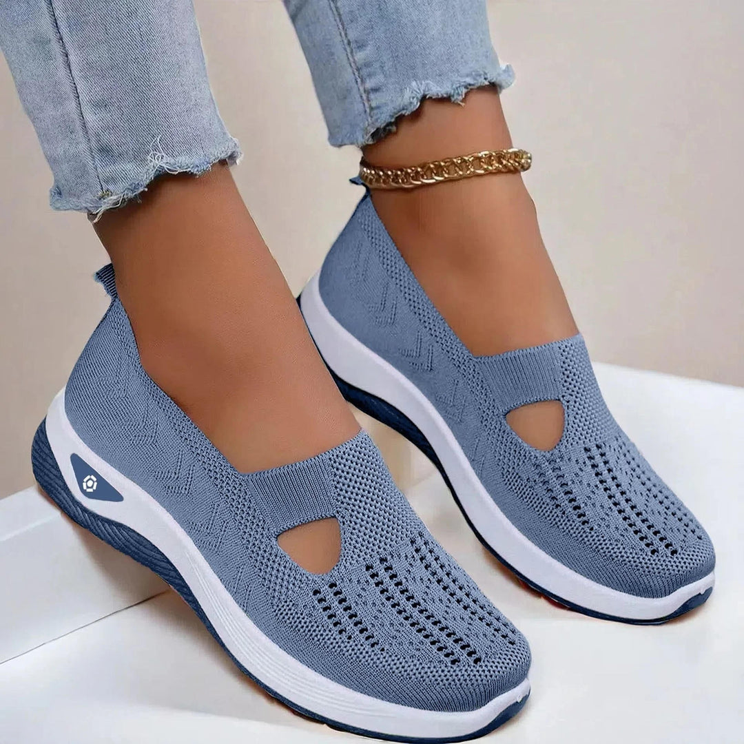 Everyday women's slip-on sneakers. Offers orthopedic arch support & breathable design for comfortable summer walking.