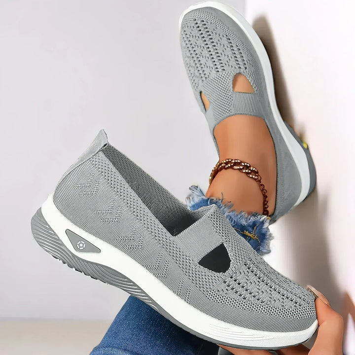 Easy-wear women's slip-on summer sneakers. Features breathable design & essential arch support for comfort.