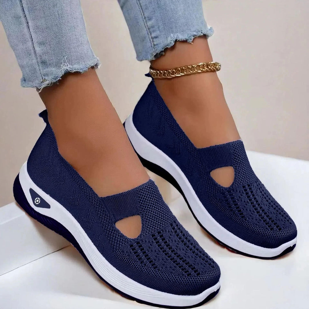 Casual women's slip-on walking shoes for summer. Offers superior arch support & breathable comfort.