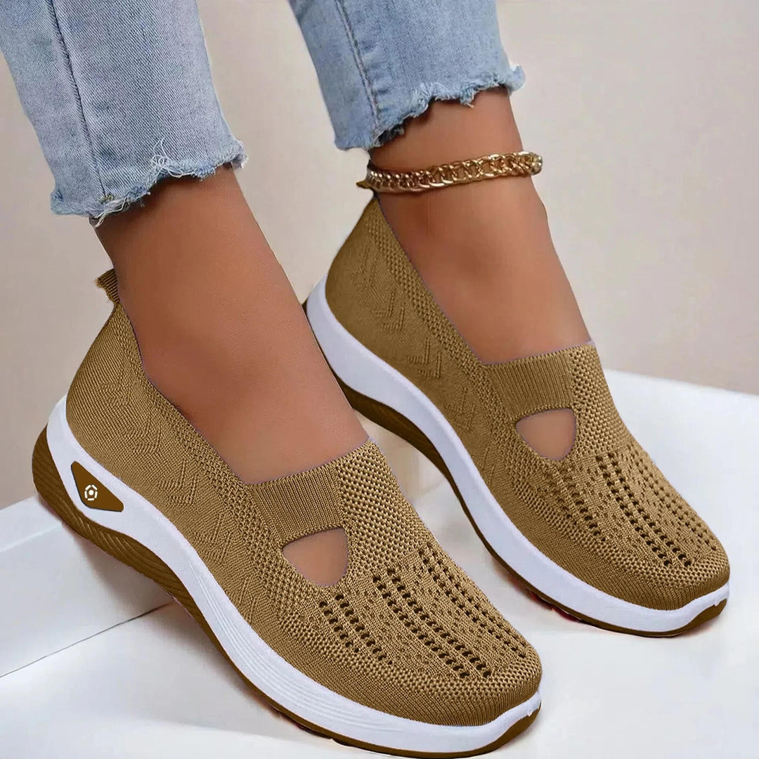 Breathable women's slip-on sneakers with arch support. Perfect comfortable footwear for everyday summer activities.