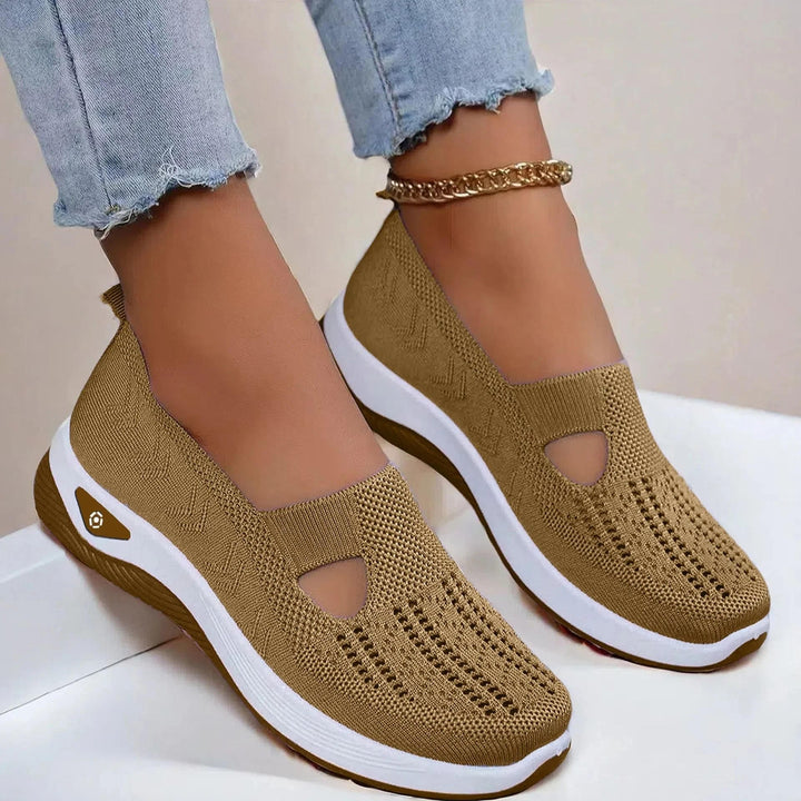 Breathable women's slip-on sneakers with arch support. Perfect comfortable footwear for everyday summer activities.