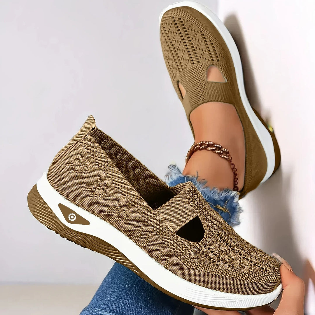 Women's slip-on summer sneakers, ideal for travel. Features arch support & breathable comfort for long walks.