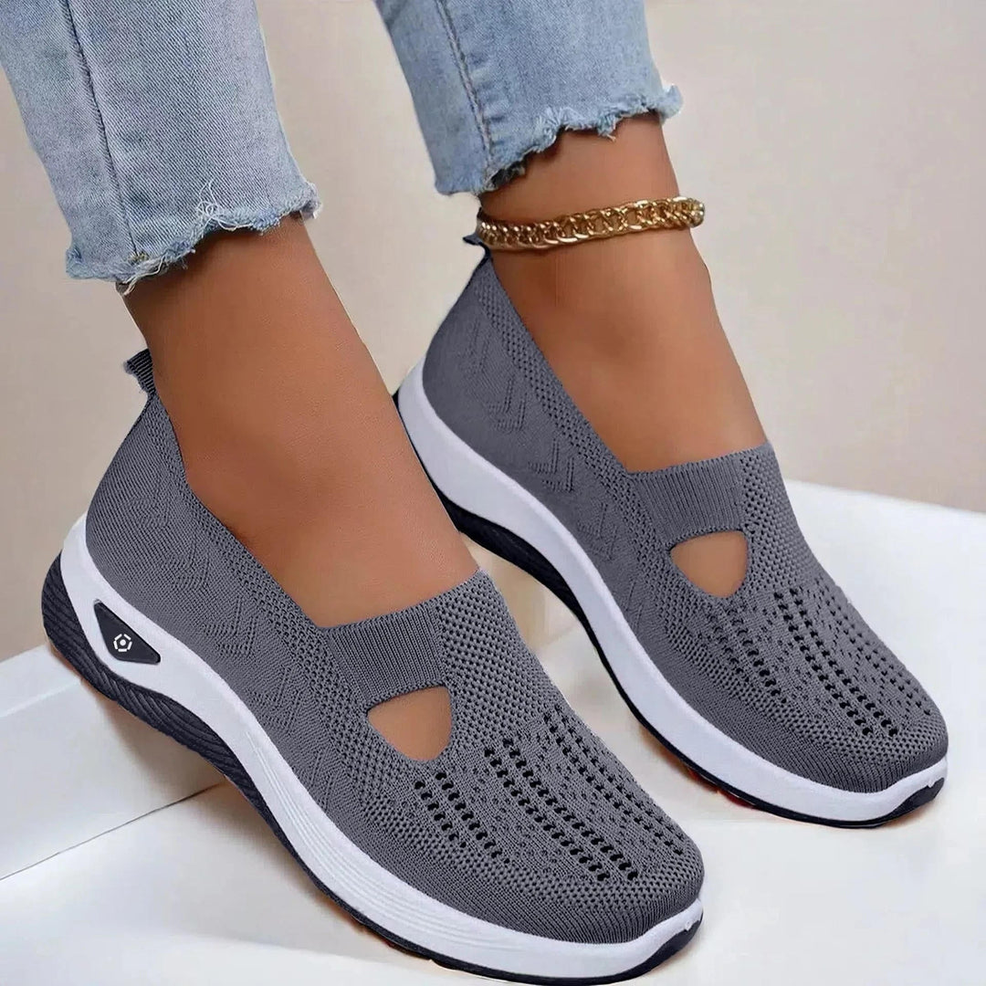 Easy-to-wear women's slip-on sneakers. Essential arch support & breathable material for summer comfort.