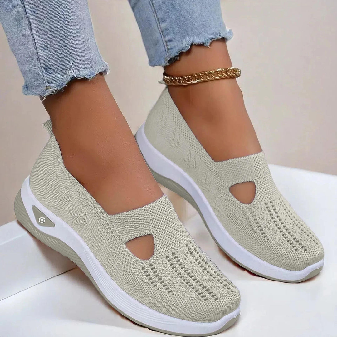 Comfortable women's slip-on walking sneakers with arch support. Great breathable footwear for summer adventures.