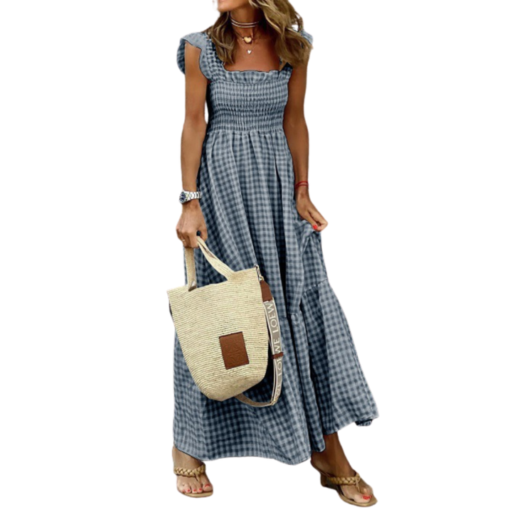 Elegant women's smocked maxi dress featuring a tiered design, ideal for summer, vacations, or effortless casual wear.