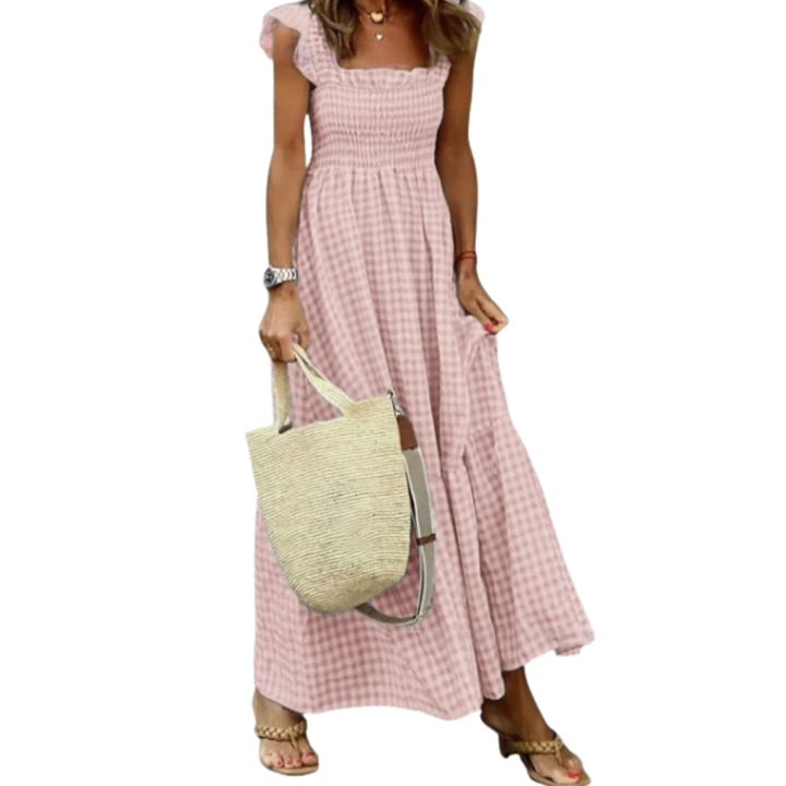 Smocked tiered maxi dress for women. A comfortable, flowy summer dress, perfect for vacation or casual elegance.
