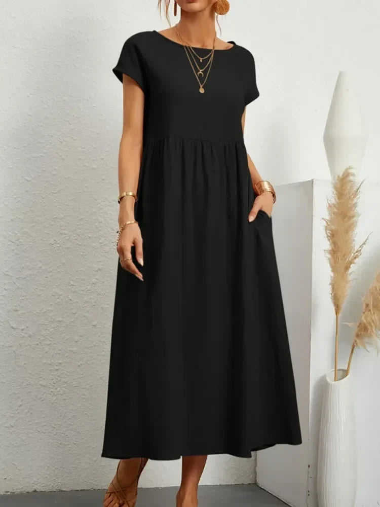 Women's smocked waist short sleeve maxi dress, a chic and comfortable A-line summer essential.