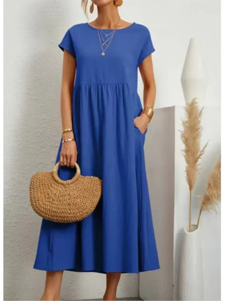 Women's smocked waist short sleeve maxi dress, casual and comfortable for summer days.
