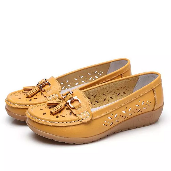 Durable, flexible sole of women's soft moccasin sandals, ensuring breathable comfort for walking.