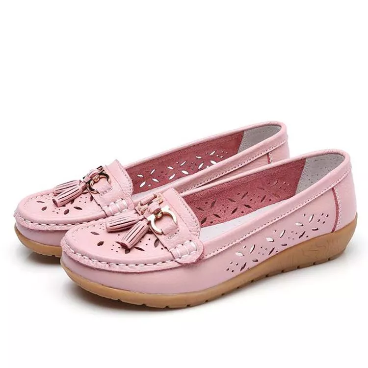 Top-down view of women's slip-on moccasin sandals, showcasing breathable, soft summer footwear.