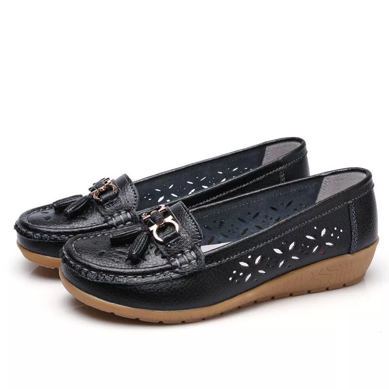 Close-up of soft breathable material on women's moccasin sandals for ultimate foot comfort.
