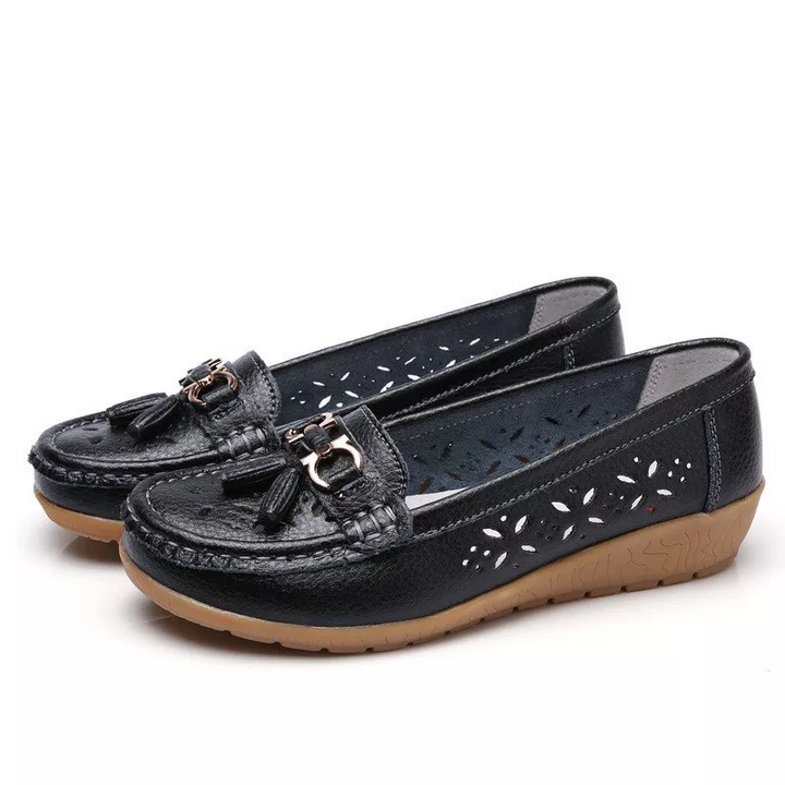 Close-up of soft breathable material on women's moccasin sandals for ultimate foot comfort.