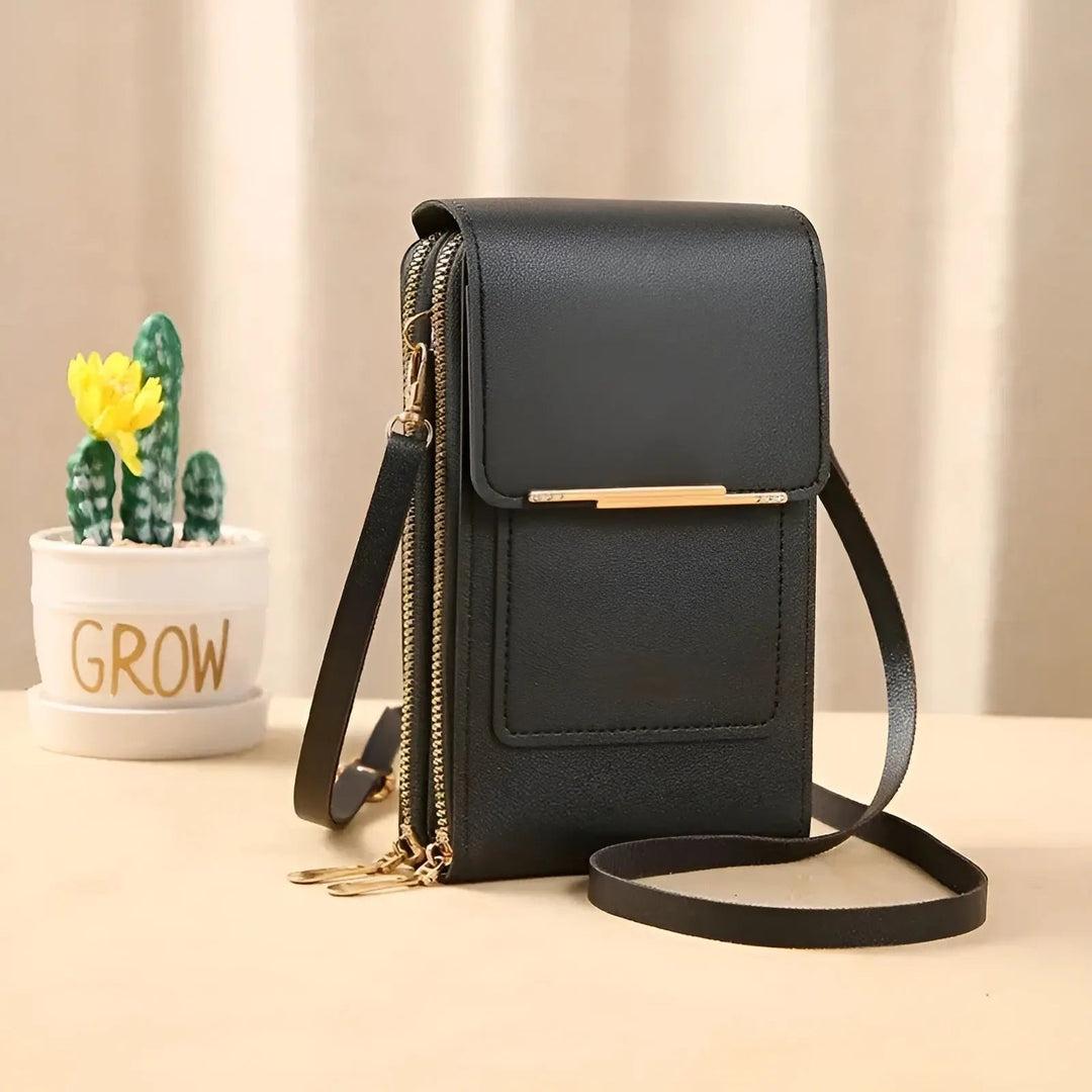 Elegant black soft leather anti-theft shoulder bag for women. Fashionable & secure.