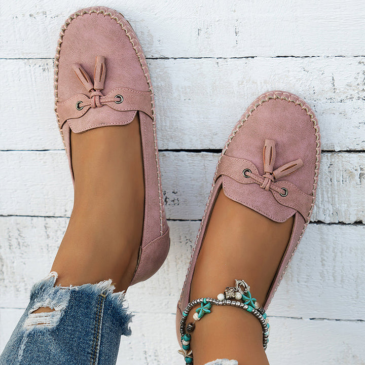 White women's comfortable loafers, great for effortless style & walking.