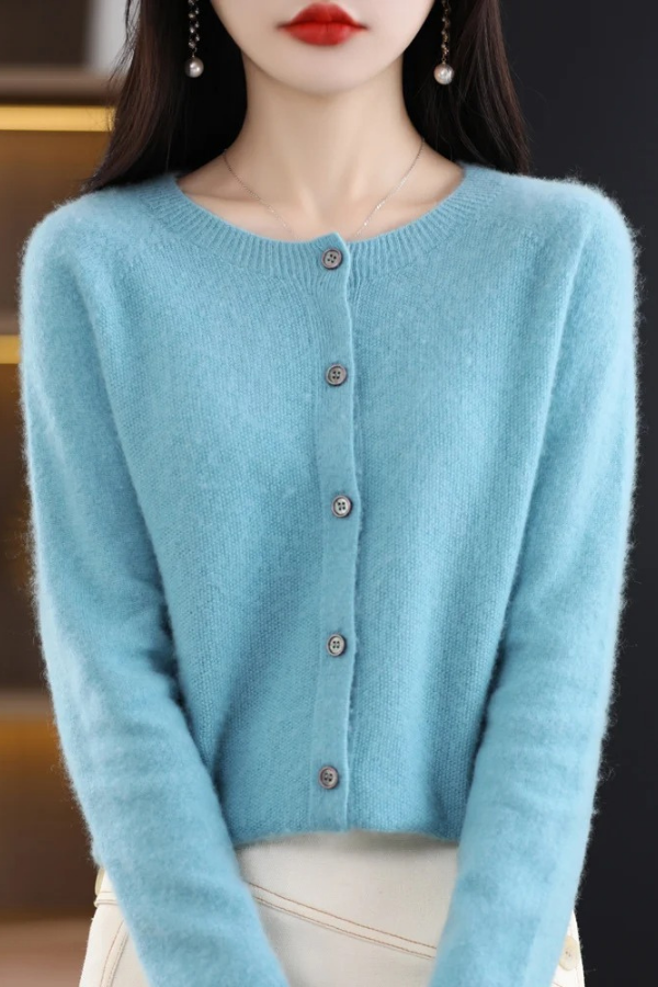 Luxuriously soft knit women's long button-front cardigan for elegant fall and winter style.