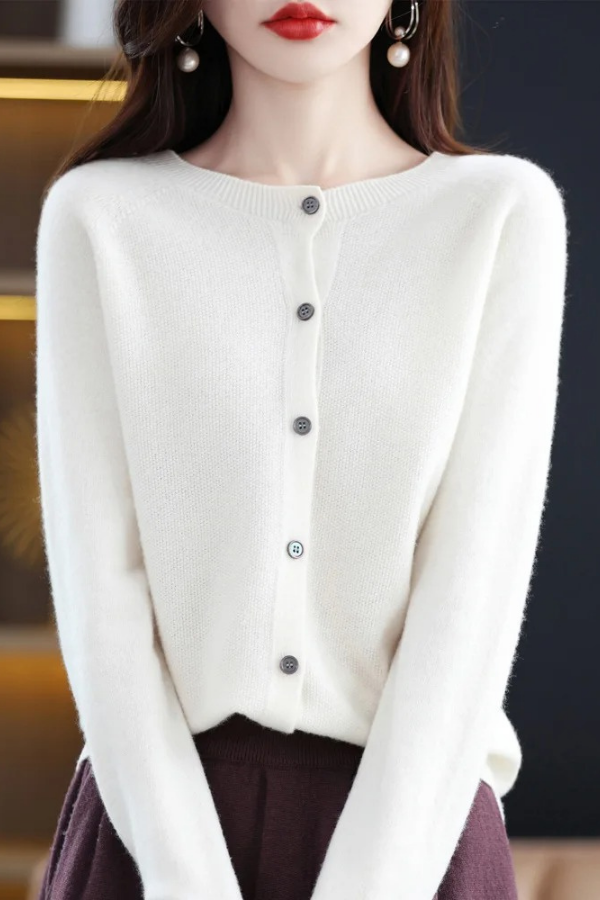 Oversized women's long button-front cardigan, a chic casual yet elegant layering piece.