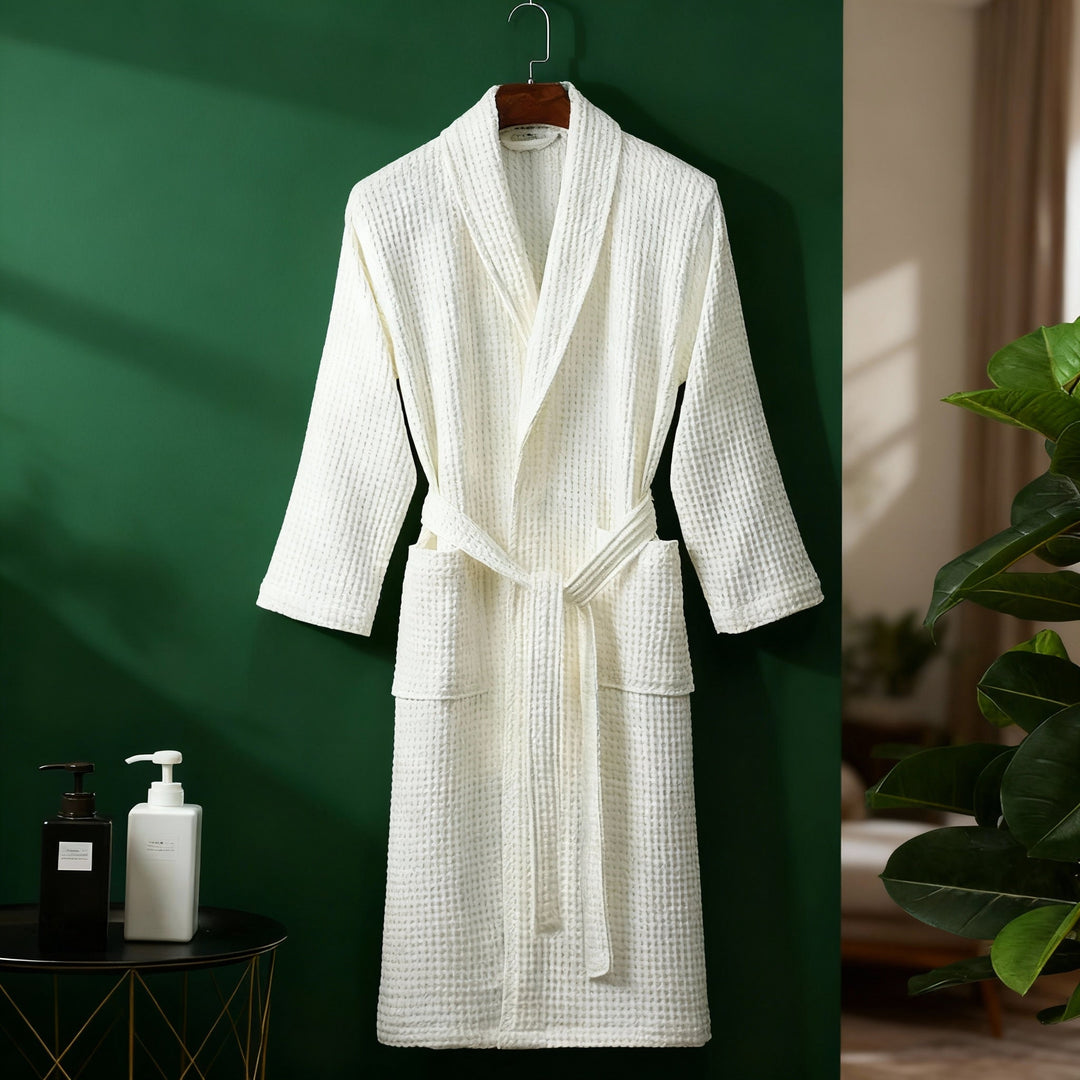 Breathable women's waffle robe with a tie waist, ideal as comfortable lounge wear or sleepwear.