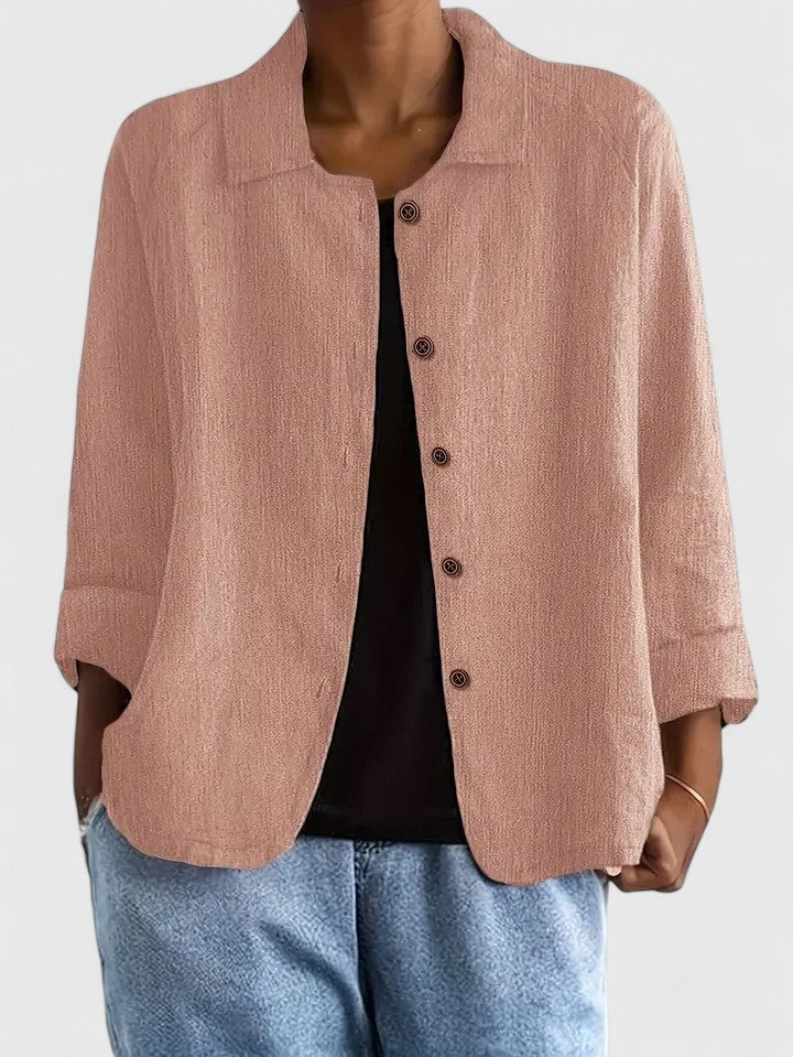 Women's sophisticated long-sleeve top, elegant & comfortable for everyday fashion.
